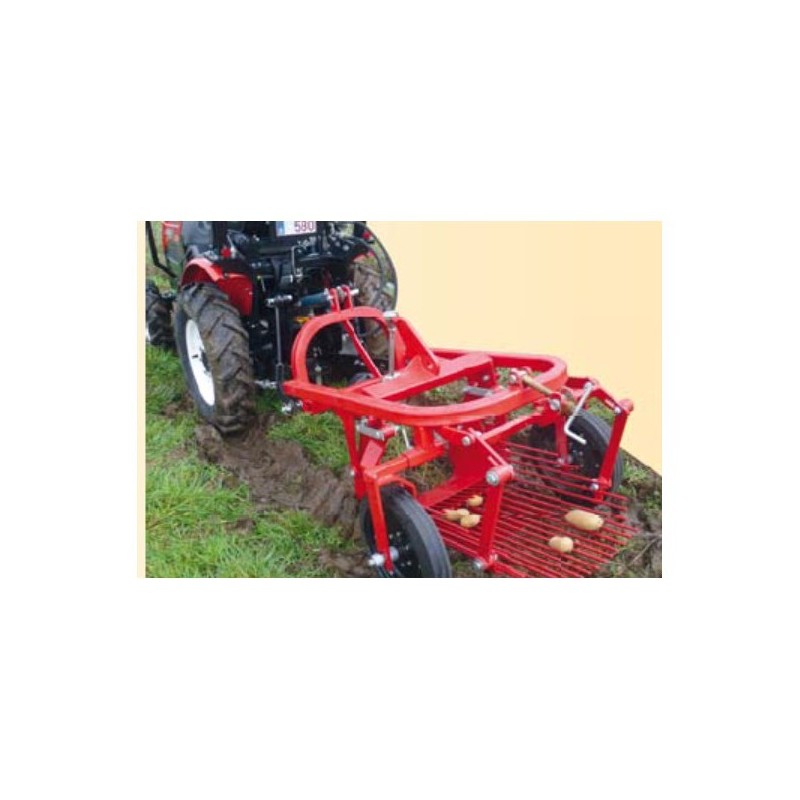 Arracheuse de pommes de terre avec éjection laérale pour micro tracteur